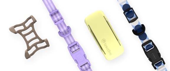 Tractive tracker accessories, including the tracker and various mounting clips.