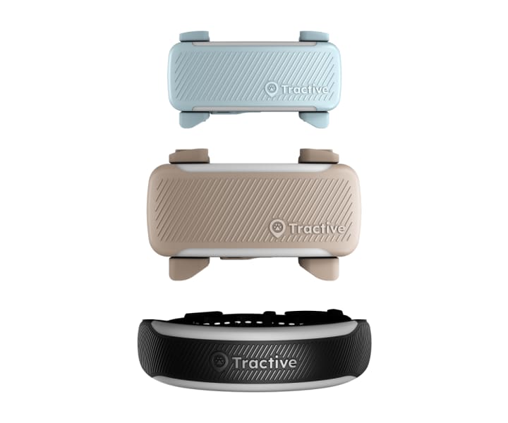 Three Tractive pet trackers in different colors and designs arranged vertically against a light background.